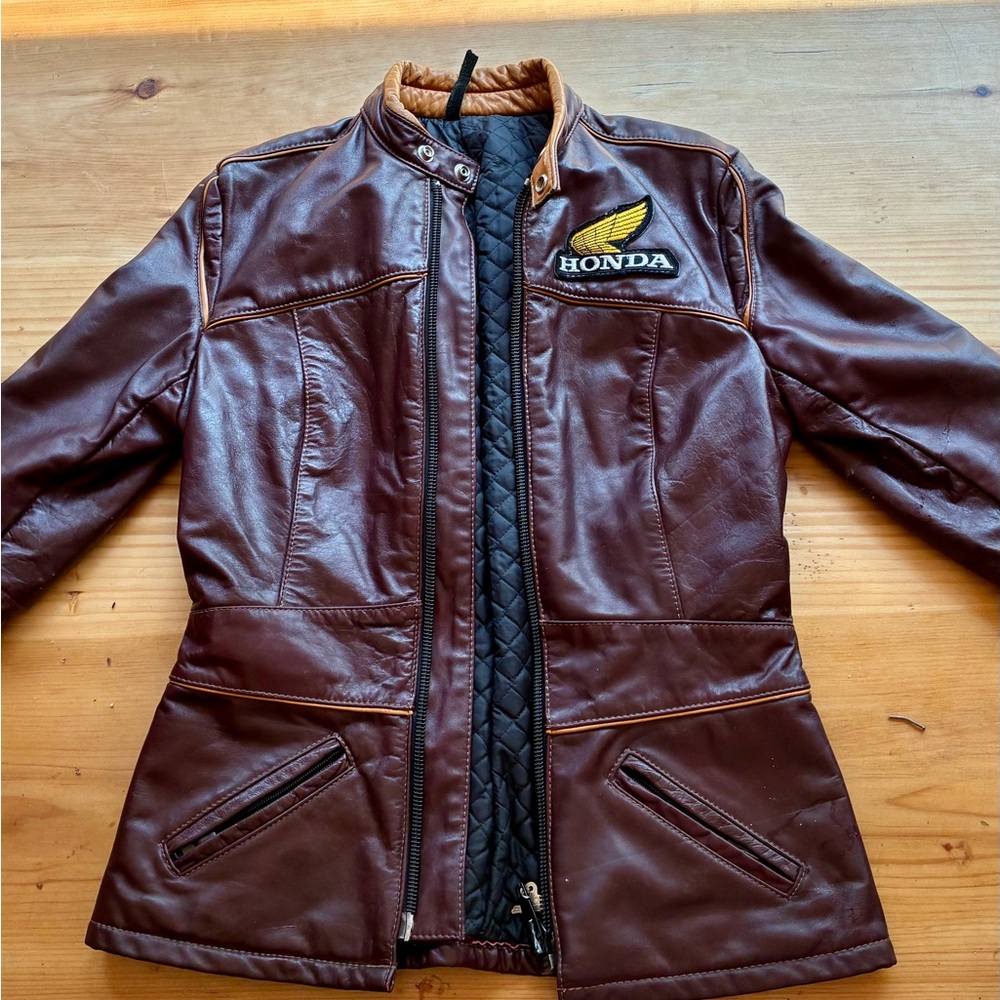 Vintage women’s Honda burgandy leather motorcycle jacket.
